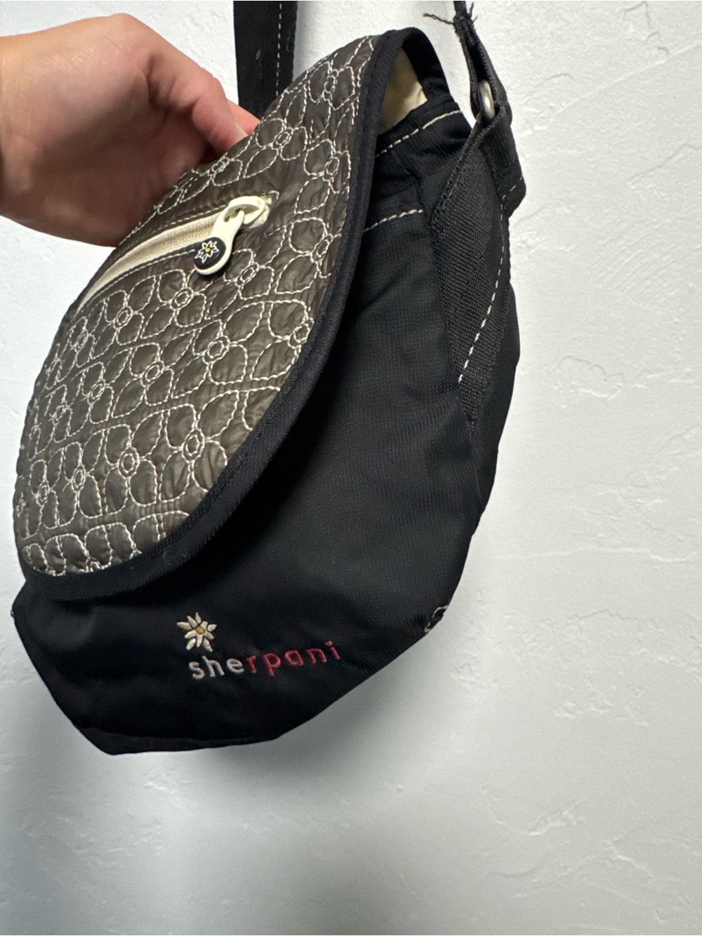 Sherpani Black Quilted-Flap Messenger Crossbody with Cream Zip Detail